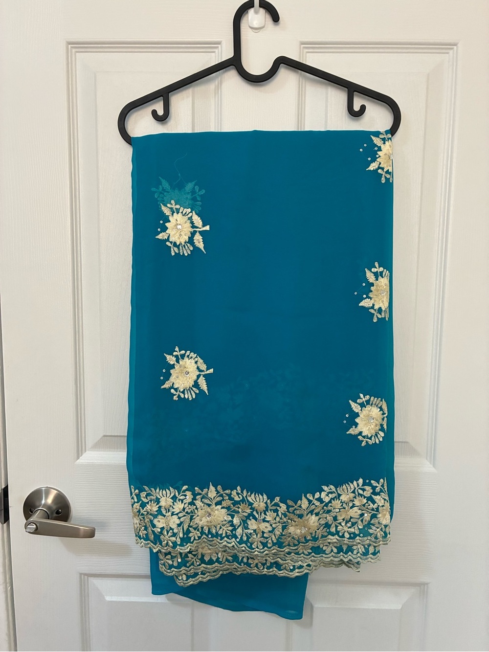 Teal georgette embroidered saree